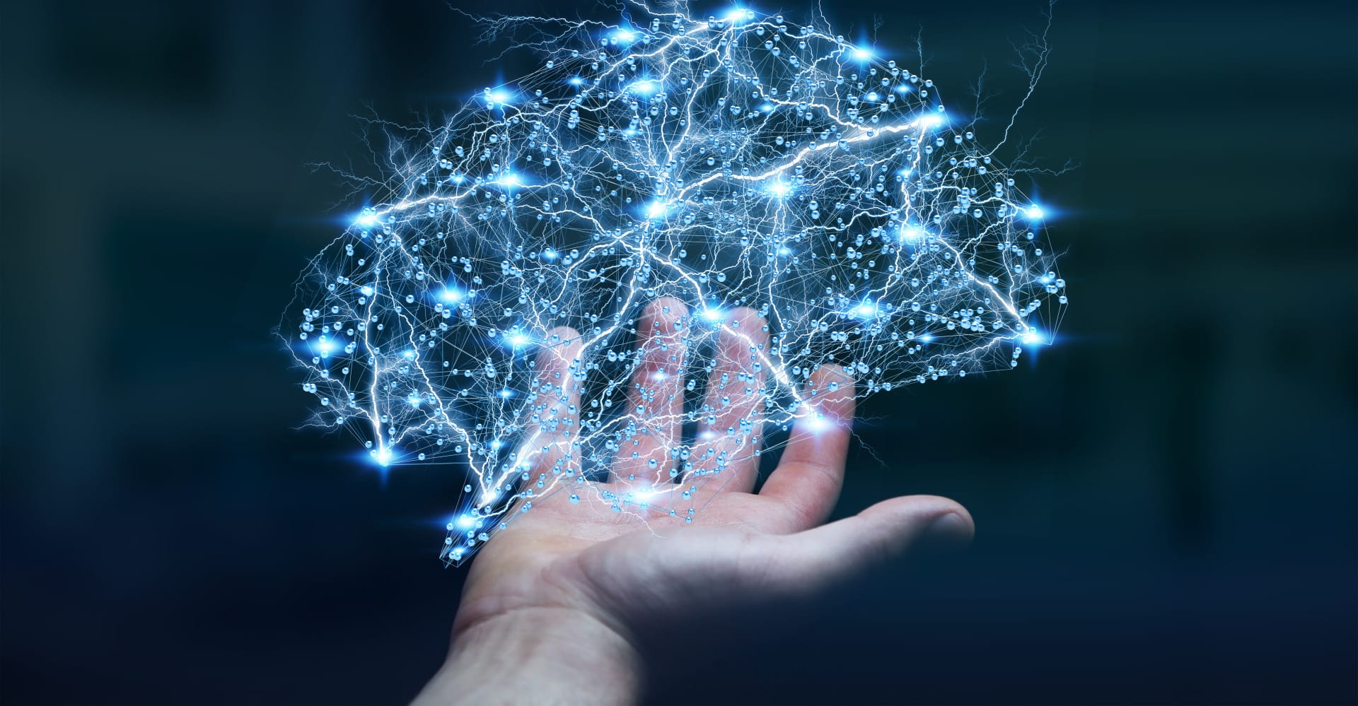 Hand holding electric brain NLP