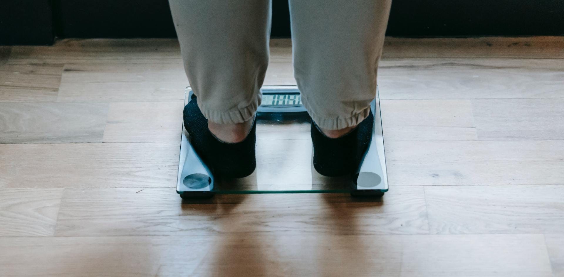 Legs on scales getting weighed